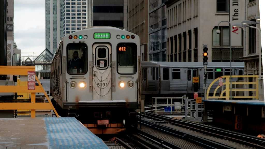 A train in Chicago going around a curve.
