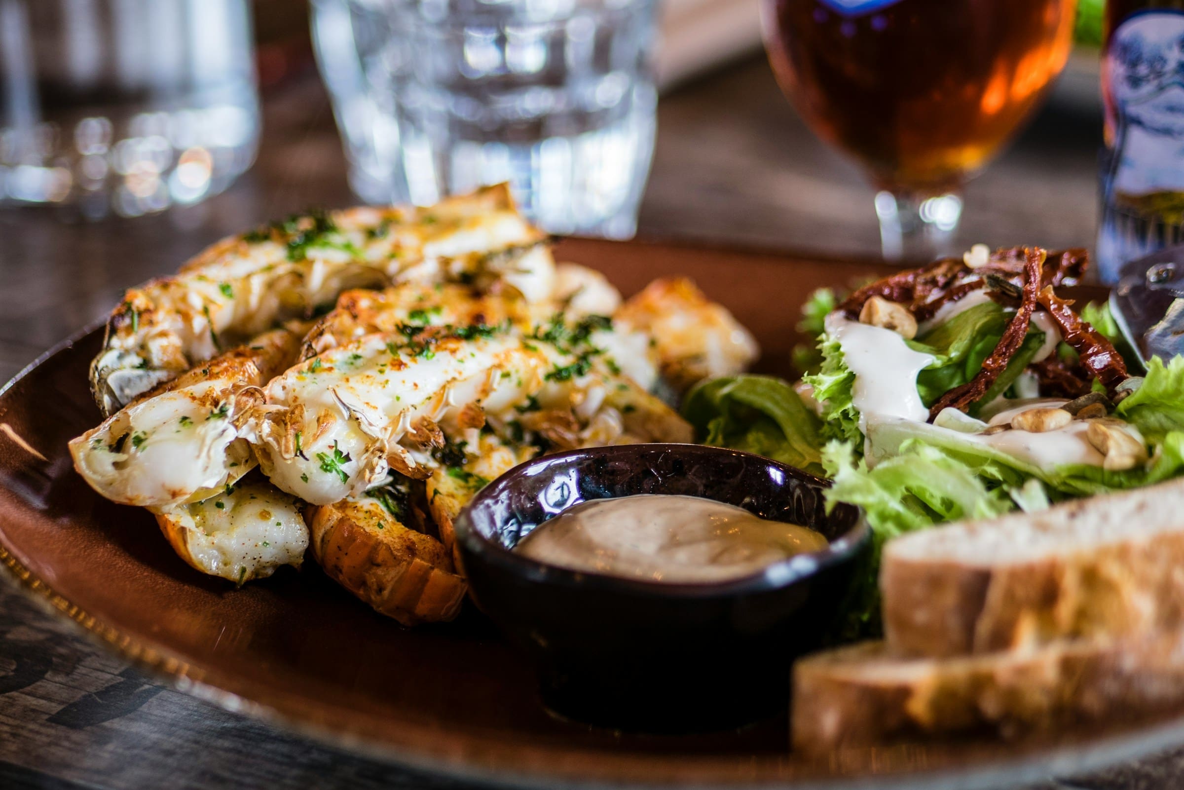 A photo of a food dish sitting on a table at a restaurant.