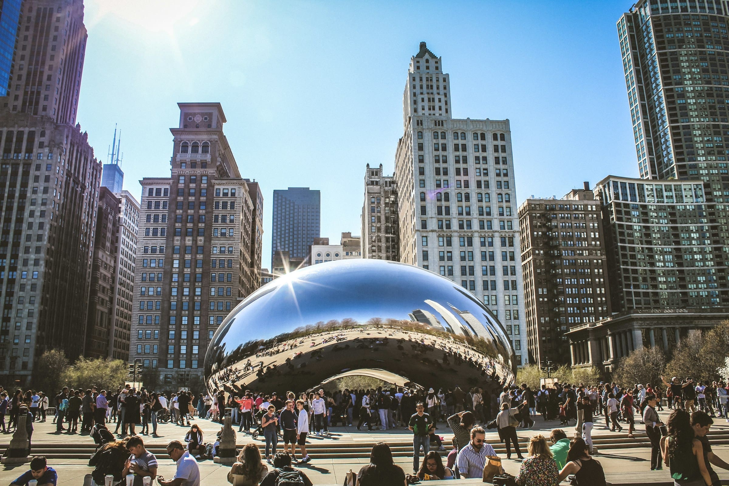 A photo of people around the Bean in Chicago.